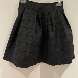 Black mid thigh skirt